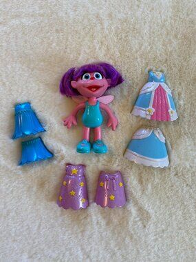 Sesame Street Abby Cadabby 6-inch Doll with 3 Snap-On Outfits Dress Up